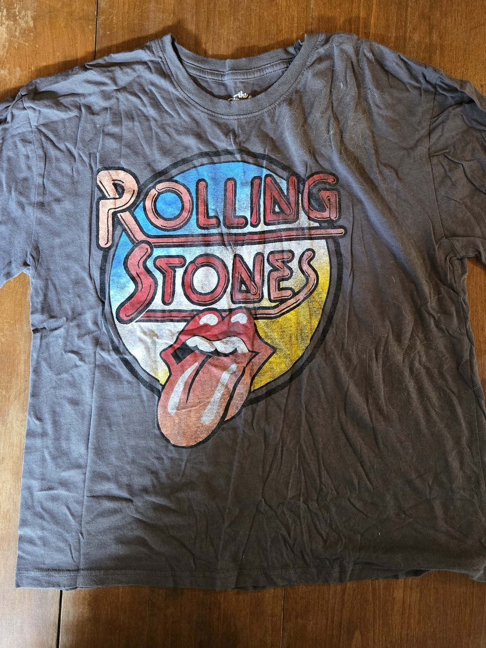 the Rolling Stones Black Tee with Red, Blue & Yellow Logo
